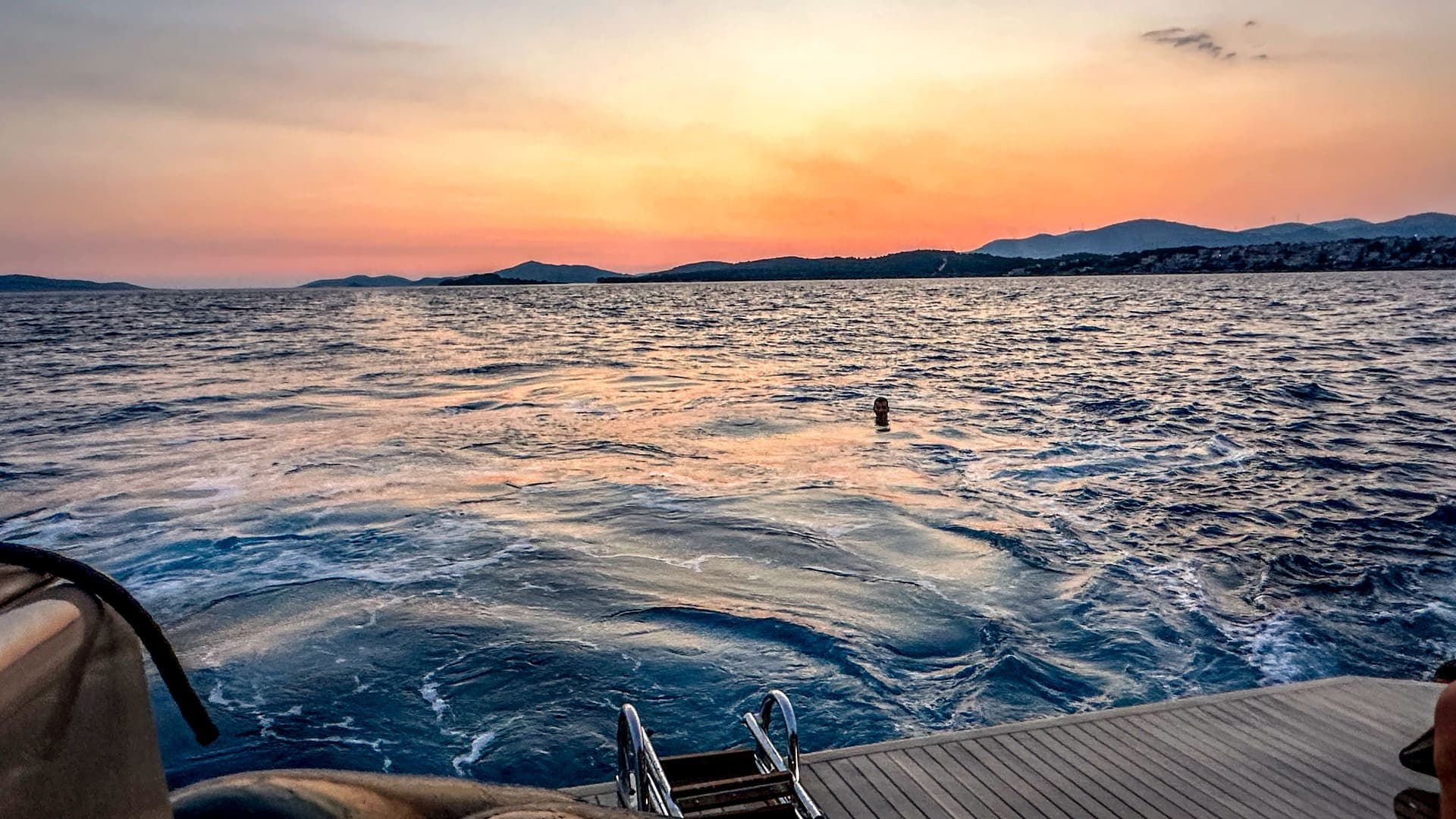 Rebelde boats contact photo featuring sunset from boat sundeck