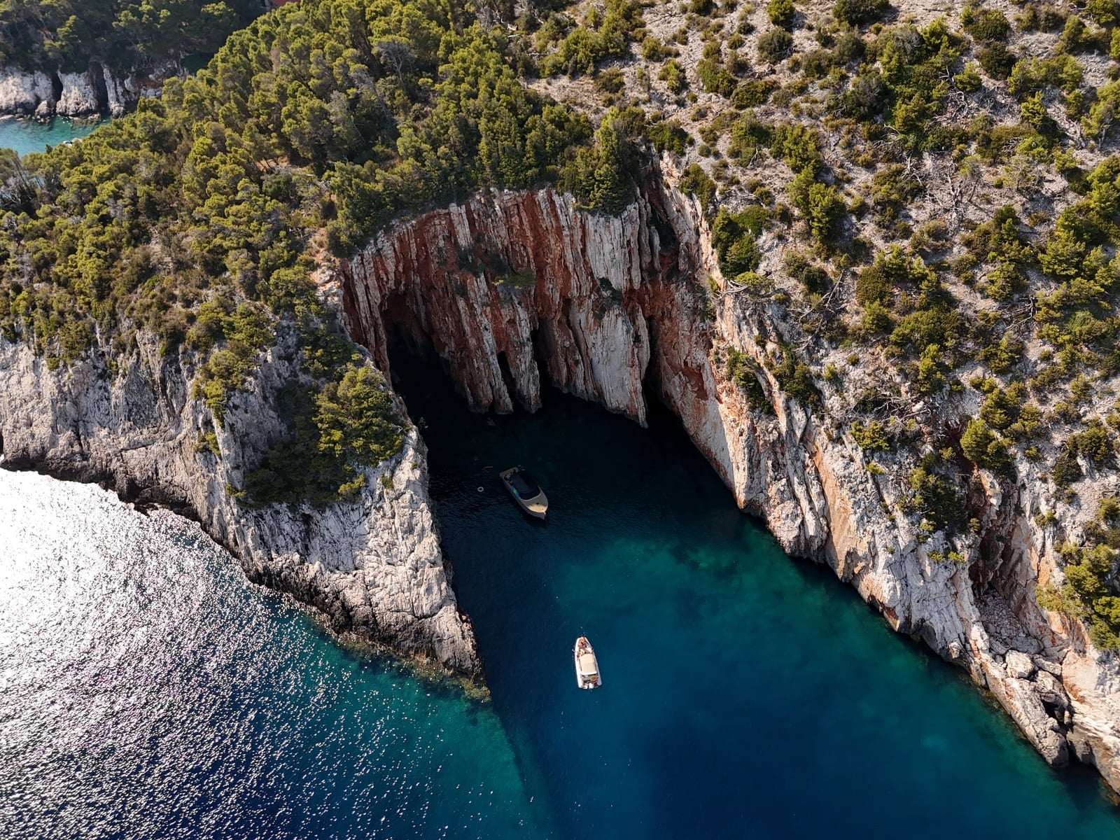 Rebelde Boats - Felix 37 Buenaventura resting quietly at anchor at Red rocks, Hvar island, Croatia