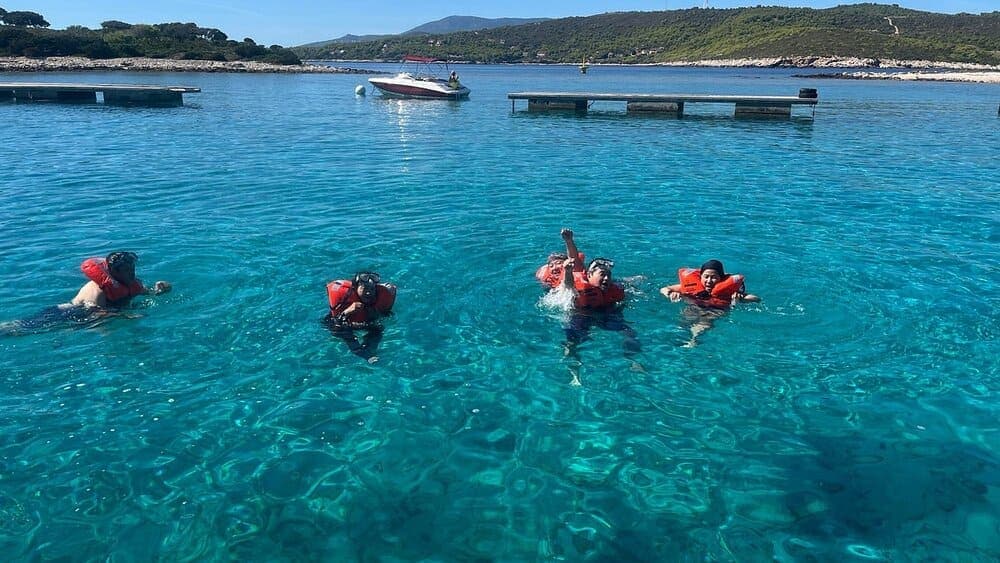 Rebelde Boats skipper at the helm navigating the Adriatic between Hvar and Vis