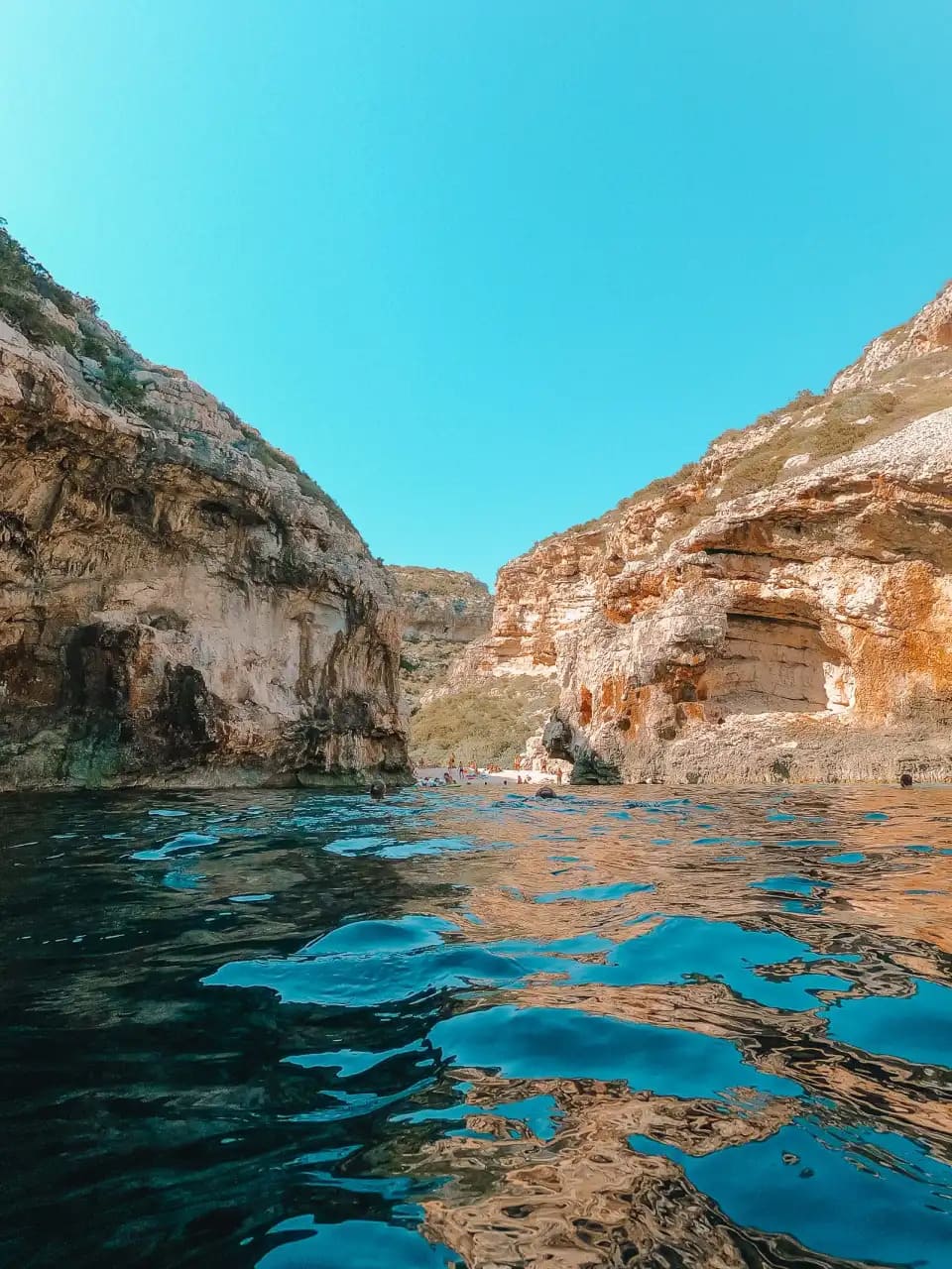 Light pouring into a quiet cavern on the Adriatic coast