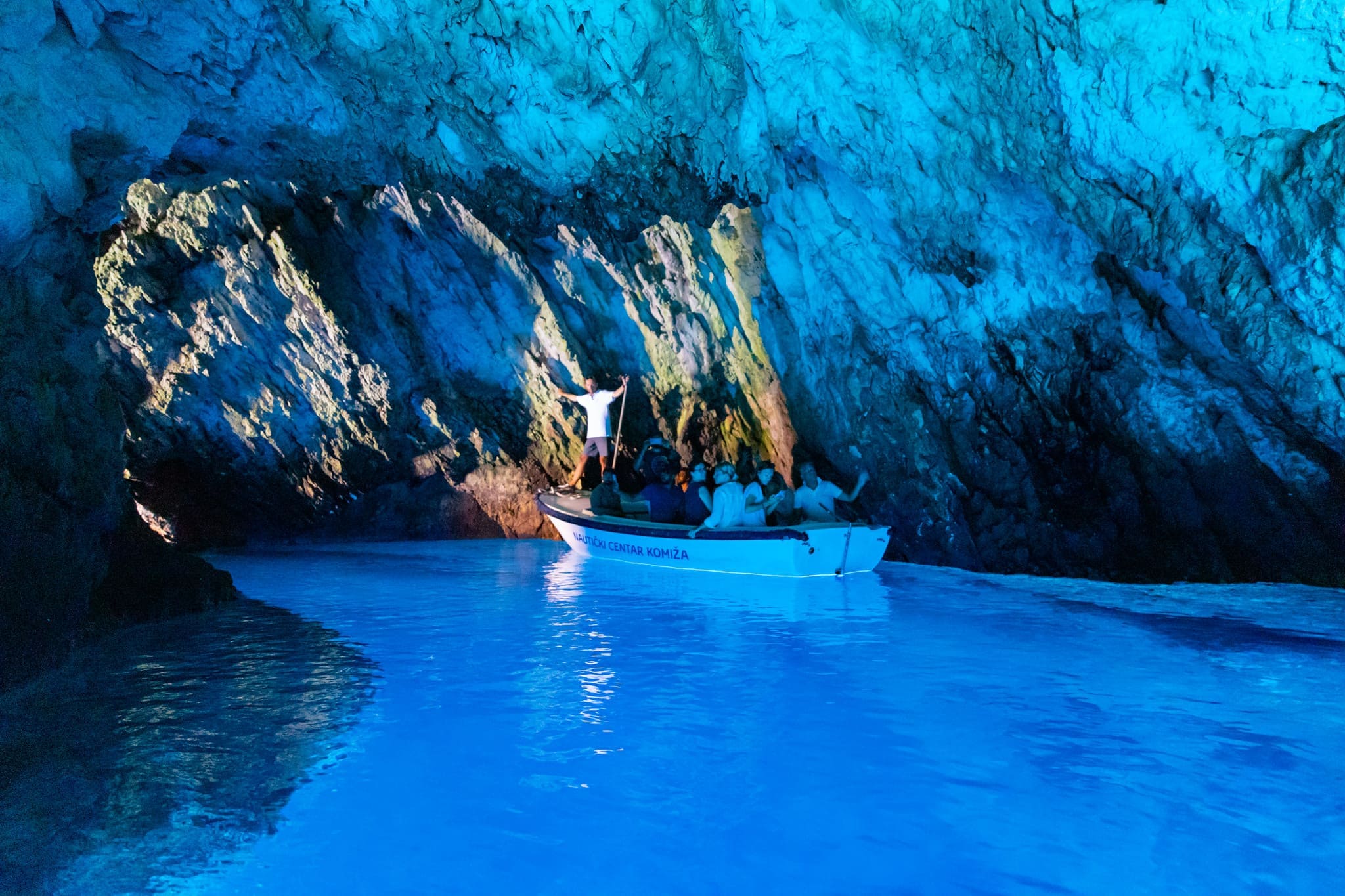 Electric blue light inside the famous Blue Cave on Biševo island near Vis, Croatia