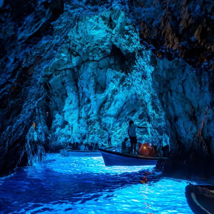 Electric blue light inside the famous Blue Cave on Biševo island near Vis, Croatia