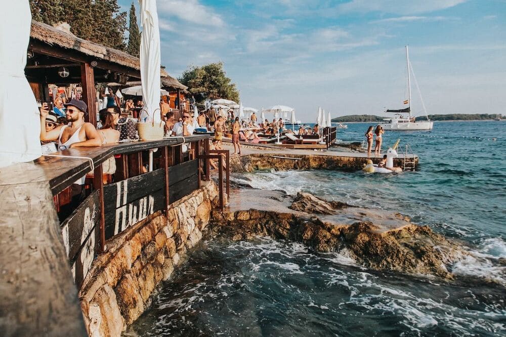 A drink with a view at Hula Hula — the island's legendary sunset bar