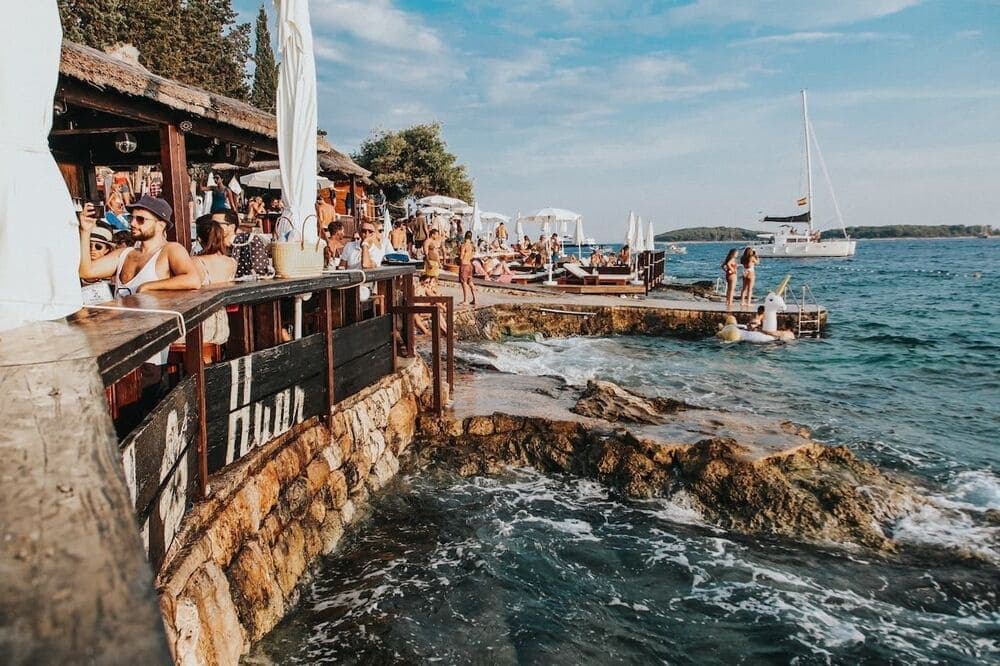 A drink with a view at Hula Hula — the island's legendary sunset bar
