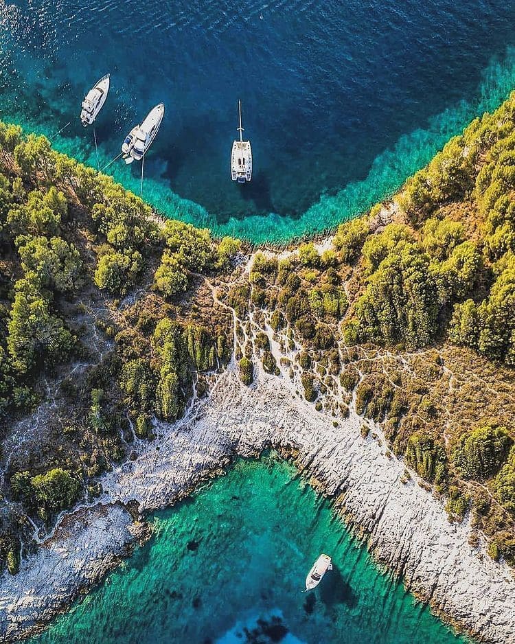 Pine-fringed coves and emerald shallows of the Pakleni islands